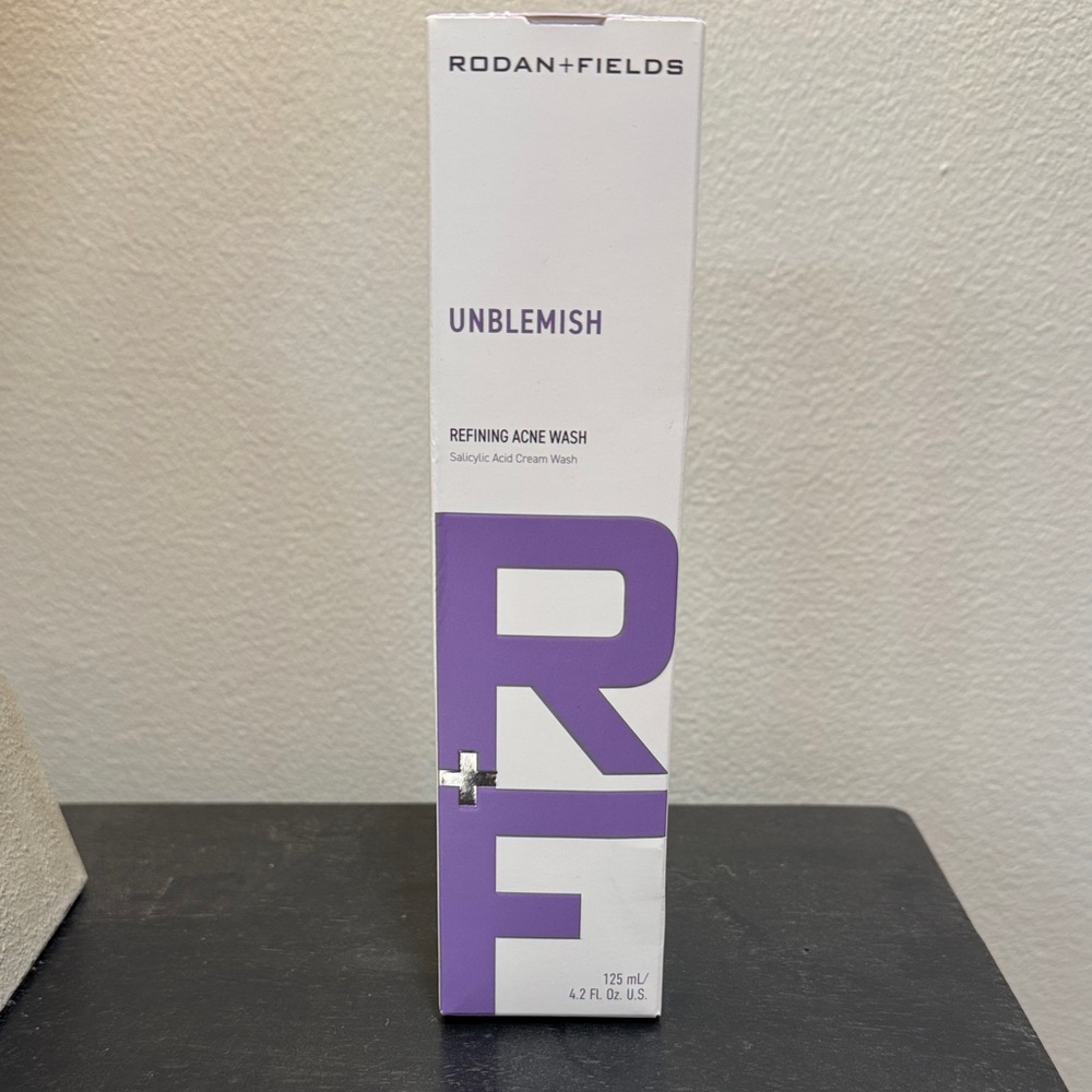 Rodan + Fields Unblemish Refining Wash in Purple and White